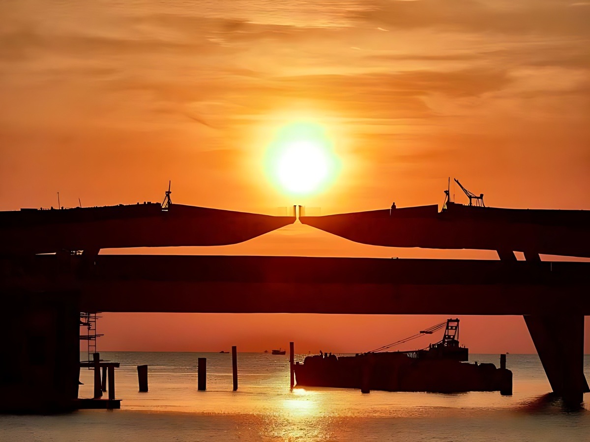 Travelers enjoying a memorable sunset moment at Kiss Bridge.