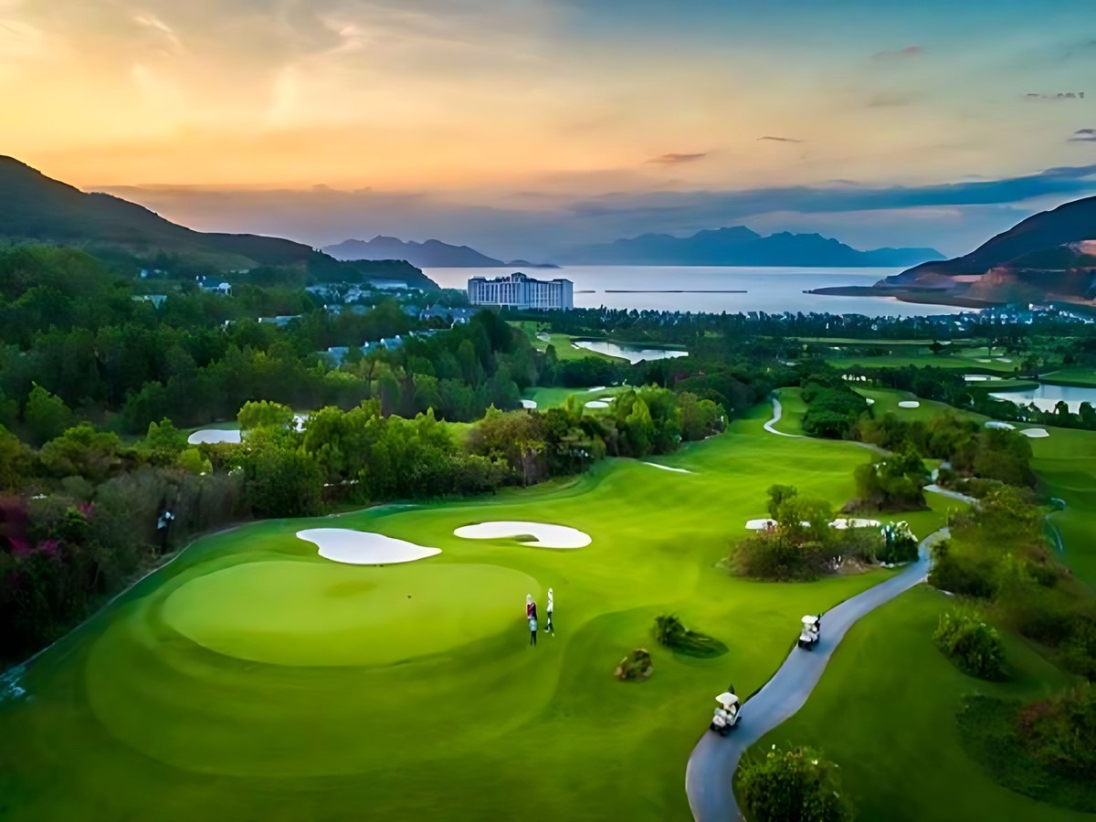 Phu Quoc golf course stretching along the coast beside a luxury resort.
