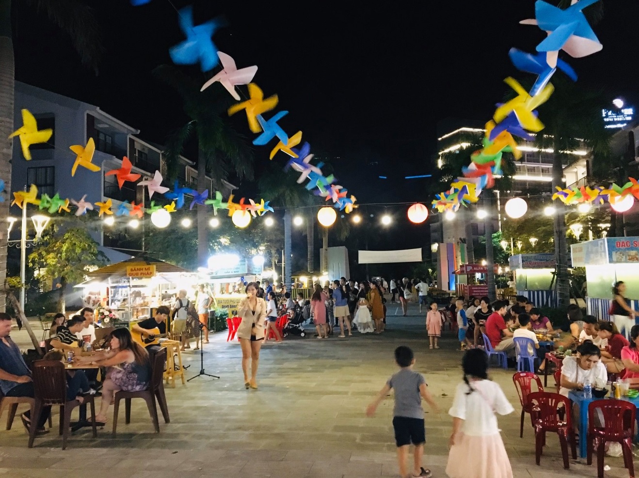 Peaceful ambience, outdoor tables and live performance space at Long Beach Night Market 